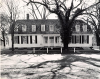 Black and White Photograph of front of House/Tavern