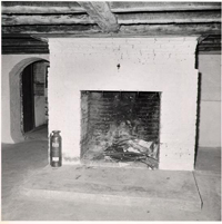 Black and White Photograph of Basement Fireplace