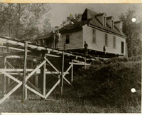 Opposite page, the James Galt House was moved a distance of about a third of a mile.  Trestles were built for crossing ravines on Francis Street.