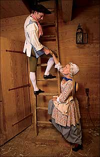 Giving the slip to censoring eyes, interpreters Richard Gilliland and Megan Brown climb into a hayloft to kindle a mock courtship.