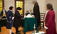 Left to right, at the signing of the Constitution, Todd Norris as George Clymer, Chris Hall as George Mason, Tom Hay, Mark Schneider as James Madison, Ben Knecht, Ron Carnegie as George Washington, and Michael Rehm as Luther Martin.