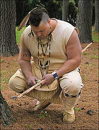 Mattaponi Indian Sam McGowan notches a stick, a common way of counting among American Indians: the number of warriors slain, animal skins traded, the cycles of the calendar.