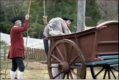 Hanging victim being loaded into cart