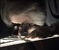Jerry Pooler checks the film