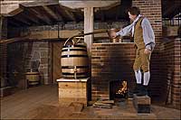 George Washington turned from politics to potables when he left the presidency. The distillery he built at Mount Vernon boiled up 11,000 gallons of whiskey in 1798. Here, Ken Johnston as Peter Bingle, Washington’s man of moonshine, in the rebuilt distillery.