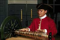 Dean Shostak plays melodies on the glass armonica with moistened fingers on glass bowls or glasses spun by a wheel.