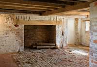 The size of the basement kitchen fireplace at seventeenth-century Bacon’s Castle in Surry County suggests its appetite for fuel.