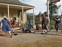 A Colonial Williamsburg camera crew films an educational re-enactment of the Stamp Act incident.