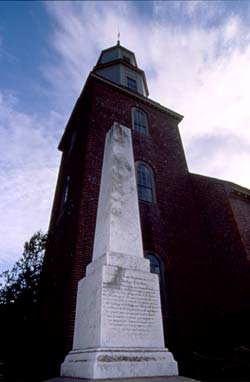 Tucker's tombstone dominates the Duke of Gloucester Street entry to Williamsburg’s Bruton Parish Graveyard. - Ellen Rudolph