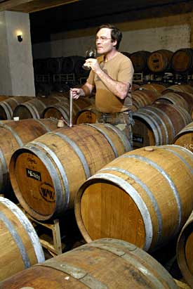 Vintner Steve Warner samples a barrel at the Williamsburg Winery.- Dave Doody
