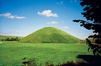 Heaving itself up to a height of 131 feet, Silbury Hill in Wiltshire, England, is a Neolithic ancestor of mottes and mounts.