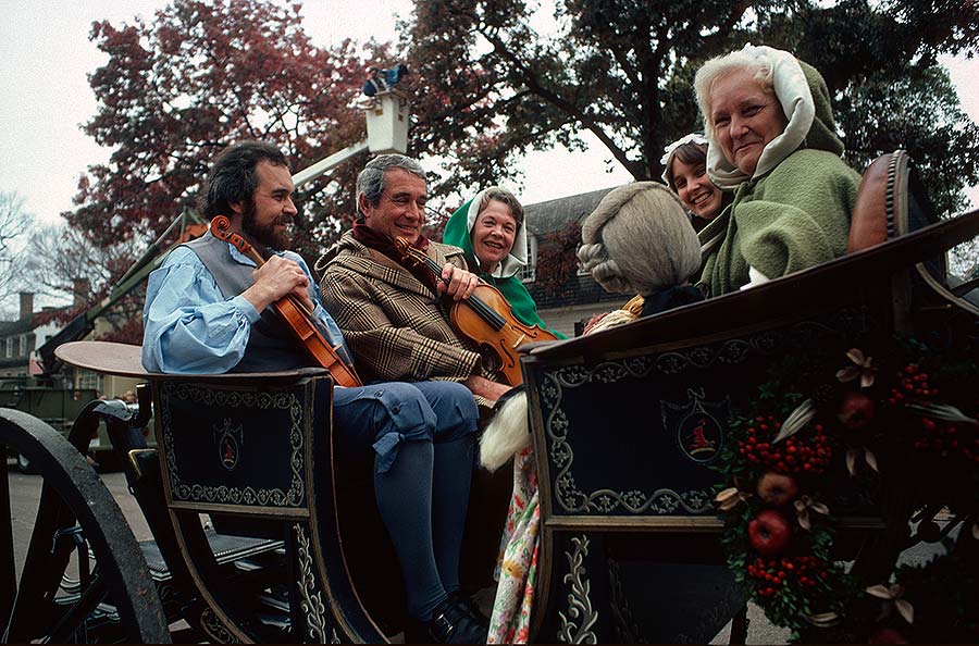 Photo of Perry Como riding in carriage, 1978.