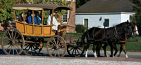 In the Historic Area version of the Williamsburg Area Transit, Dan Hard drives a stage wagon, the colonial equivalent of a bus.