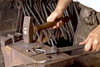 At the blacksmith’s shop, practiced tradesmen fashion nails in the eighteenth-century manner for use in Historic Area structures.