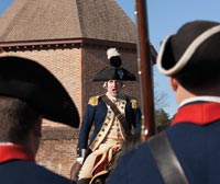 Mark Schneider as the Marquis de Lafayette exhorts the troops in front of the Historic Area’s Magazine.