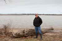 Chief Kevin Brown stands beside the river that has borne his tribe’s name since before the English reached Jamestown, and is the eastern boundary of his reservation.