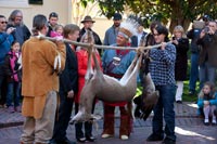 At the governor’s mansion in Richmond, Chief Brown, in headdress, brings the annual offering of venison and fowl to Governor Bob McDonnell, a promise kept for 350 years from a treaty dating to 1677.