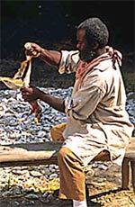 Man skinning a rabbit