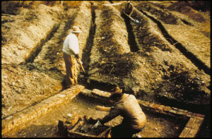Old color photo of archaeological trenches.